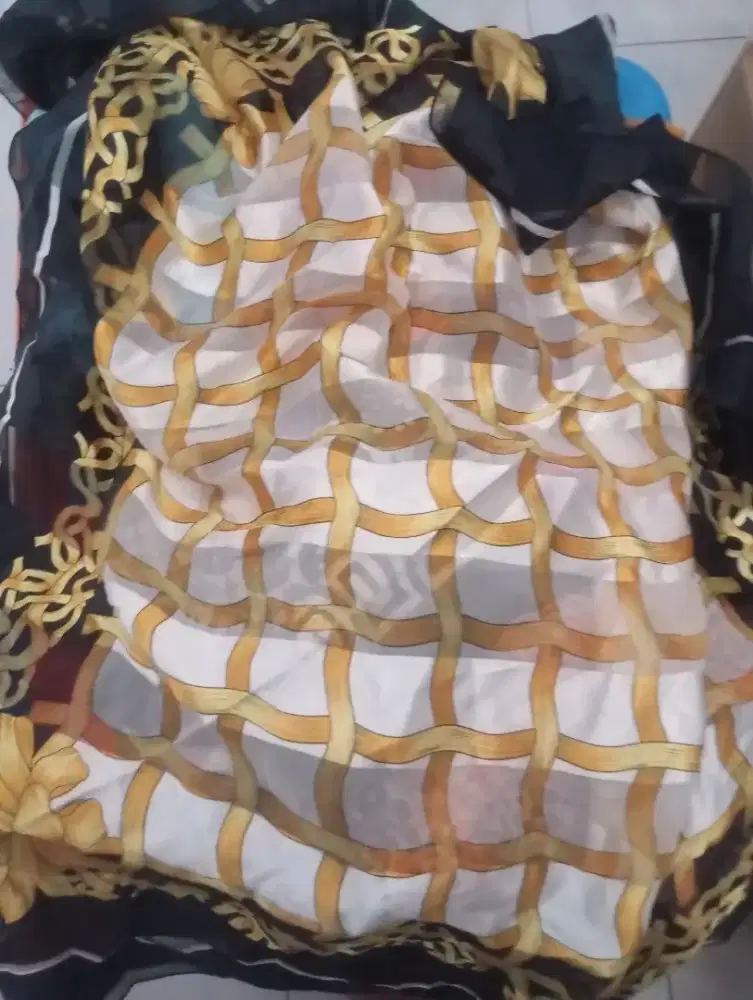 Selendang / kerudung