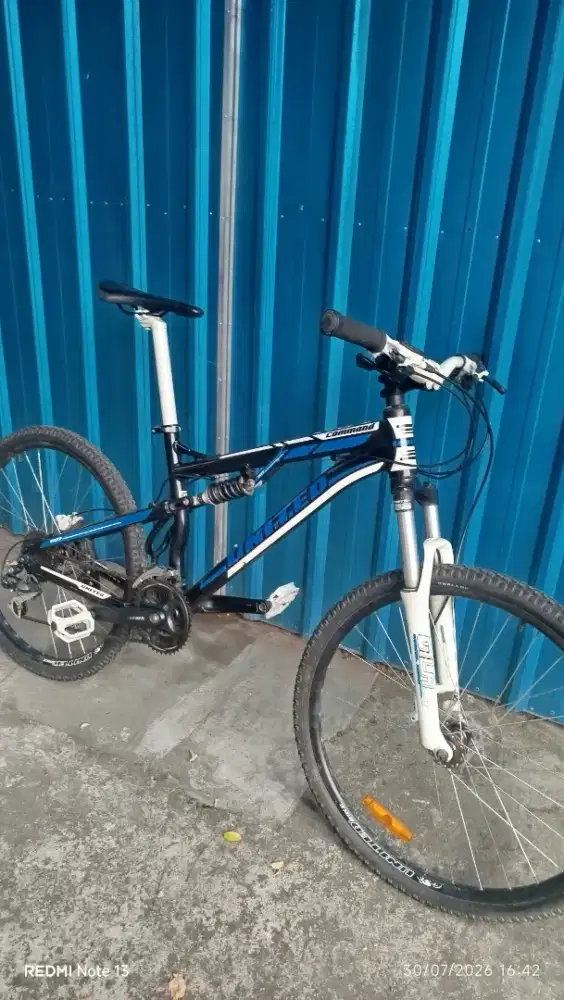 Sepeda united fx77 fullsuspensi skok empuk