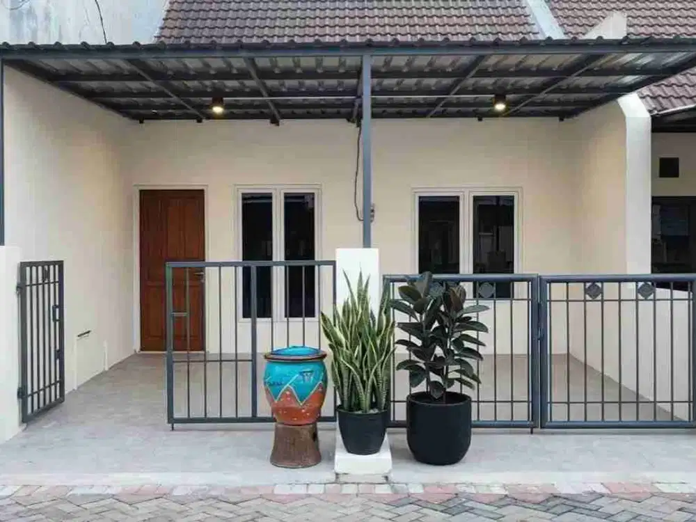 dijual rumah siap huni lokasi perum Wiguna gunung anyar surabaya