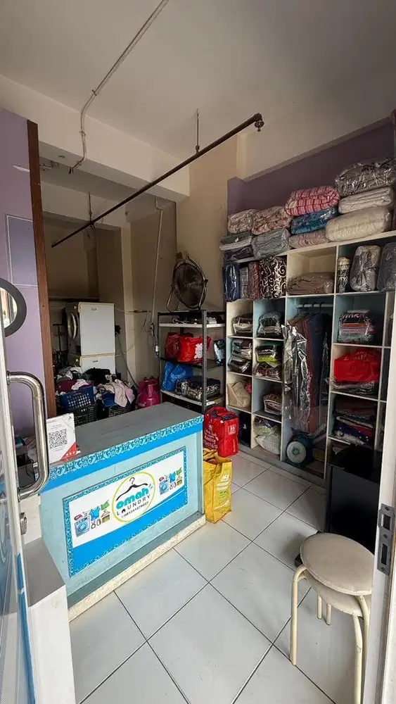 Over usaha Laundry kiloan