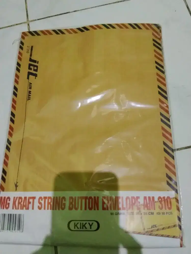 Maps coklat merk kiky isi 10 pcs