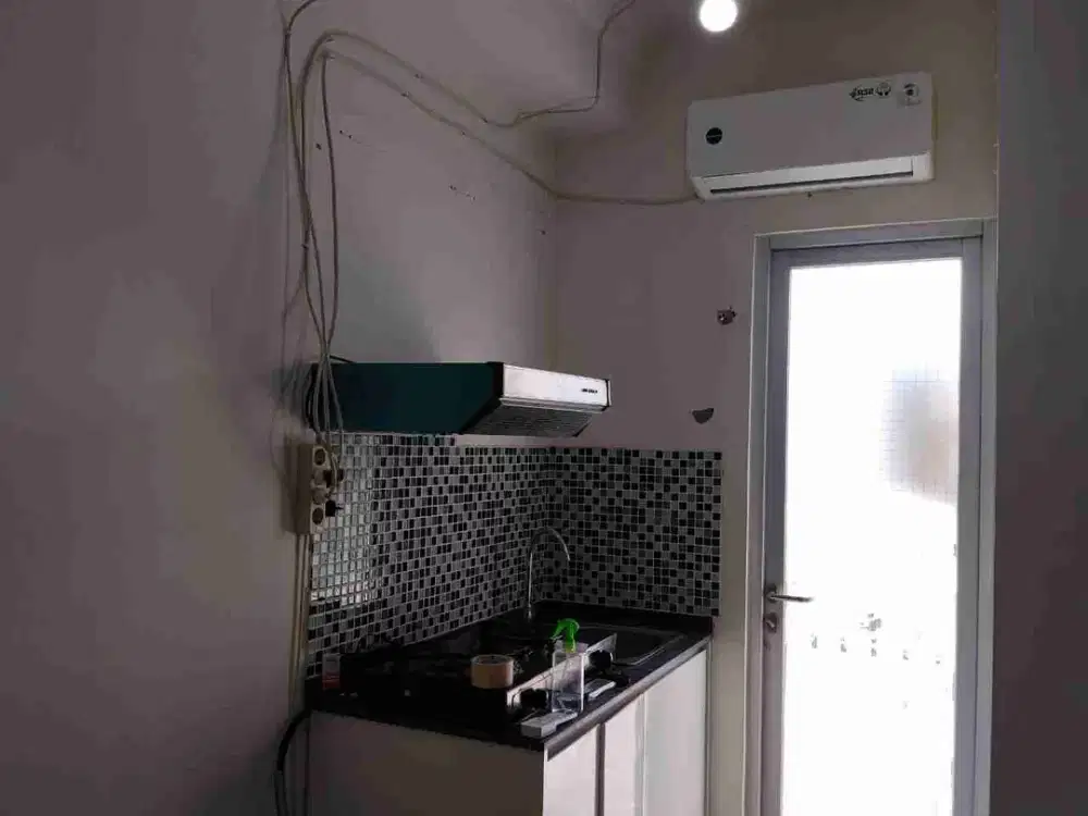 Disewakan apartemen gunawangsa Merr Tipe Studio semi Furnished