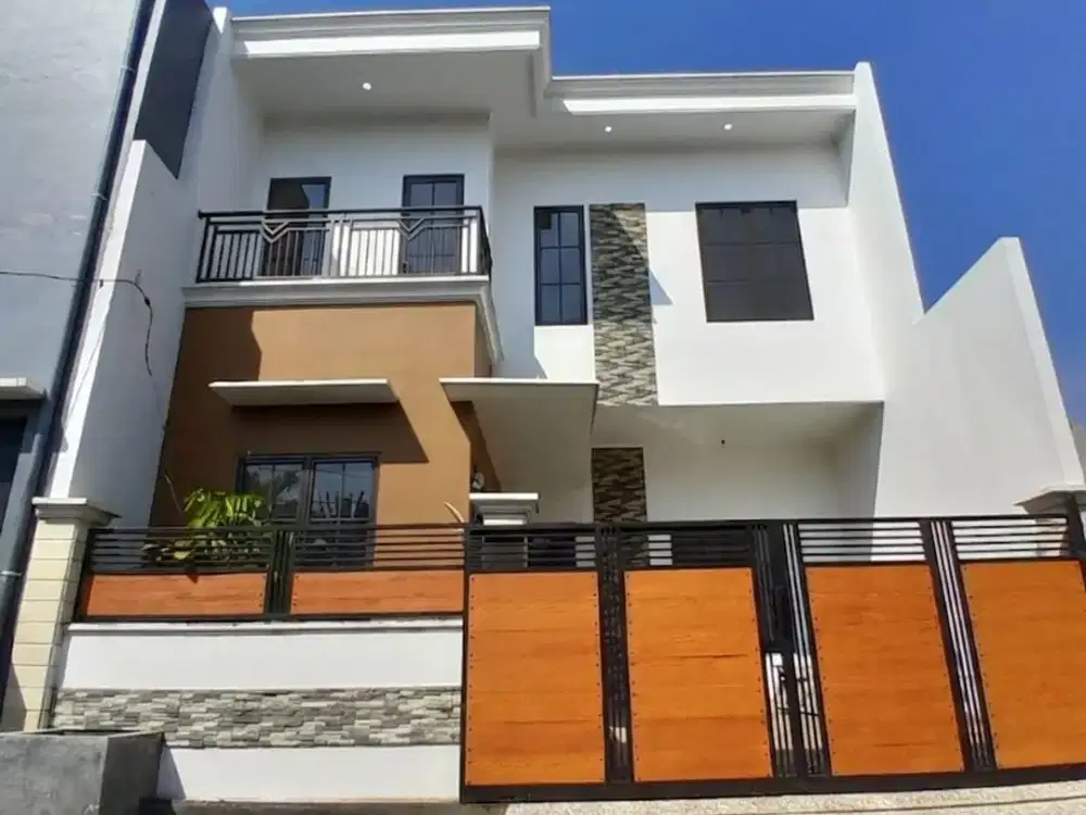 rumah 2 lantai modern tropis full pagar keamanan 24 jam dekat tol jatiwarna