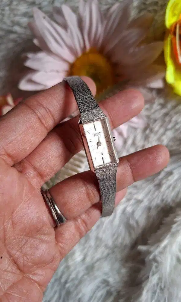 Add an elegant classic accent to your outfit. Designed with a sleek re