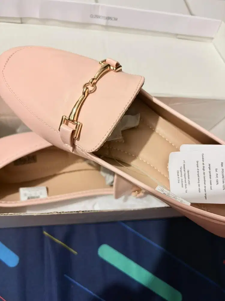 Sepatu merek MM