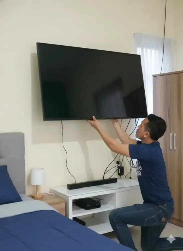 JASA PASANG BRACKET buat gantungan TV LED LCD di tembok nyaman rapih