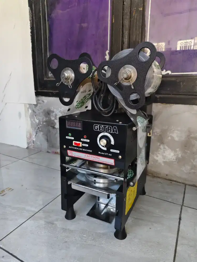 Cup sealer Getra otomatis