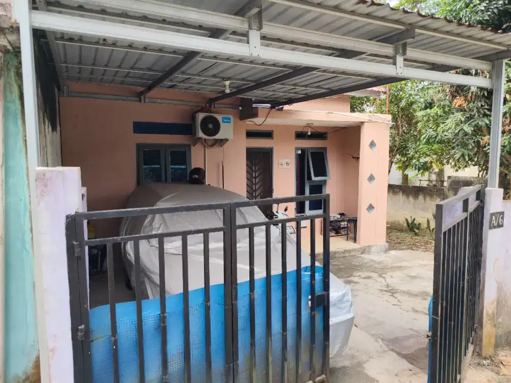 RUMAH MINIMALIS DENGAN HALAMAN LUAS