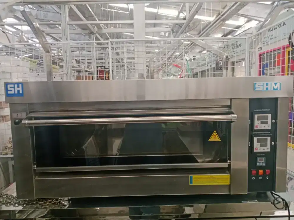 oven siap pakai semi baru bagus 9 bulan pemakaian dijual cepat