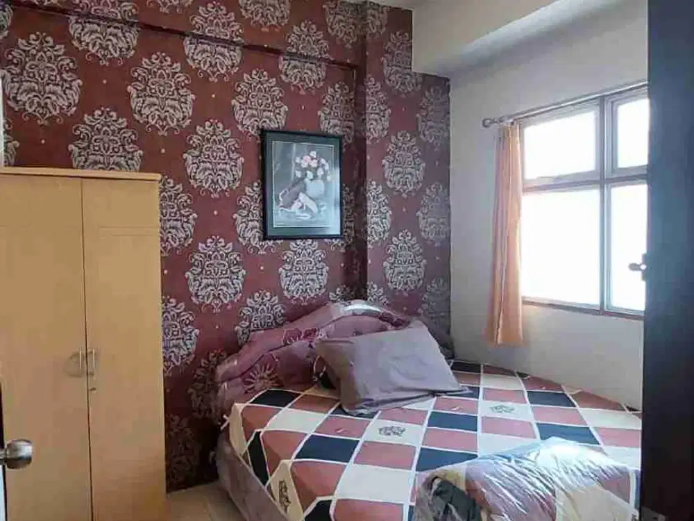 jual apartemen suites metro soekarno hatta