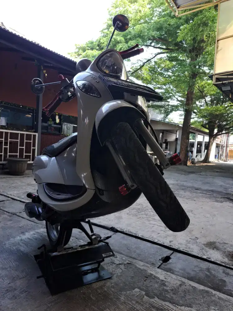 Tenaga cuci steam mobil motor