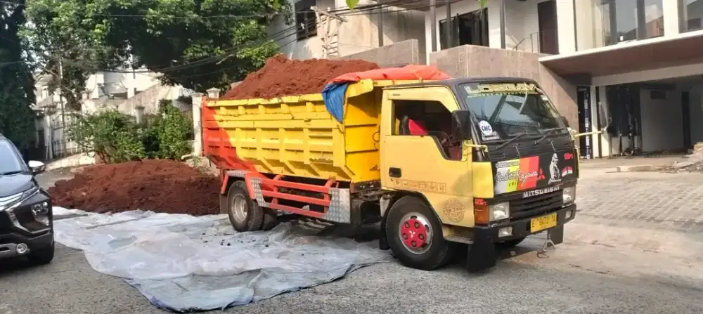 Jasa urugan dan buang puing