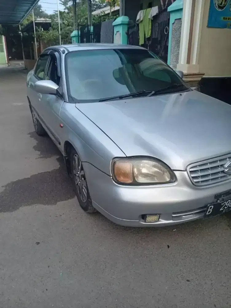 Suzuki Baleno DX.1.5 MT th 2002