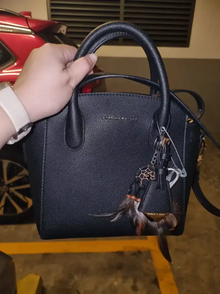 TAS + DOMPET BRANDED CHARLES AND KEITH