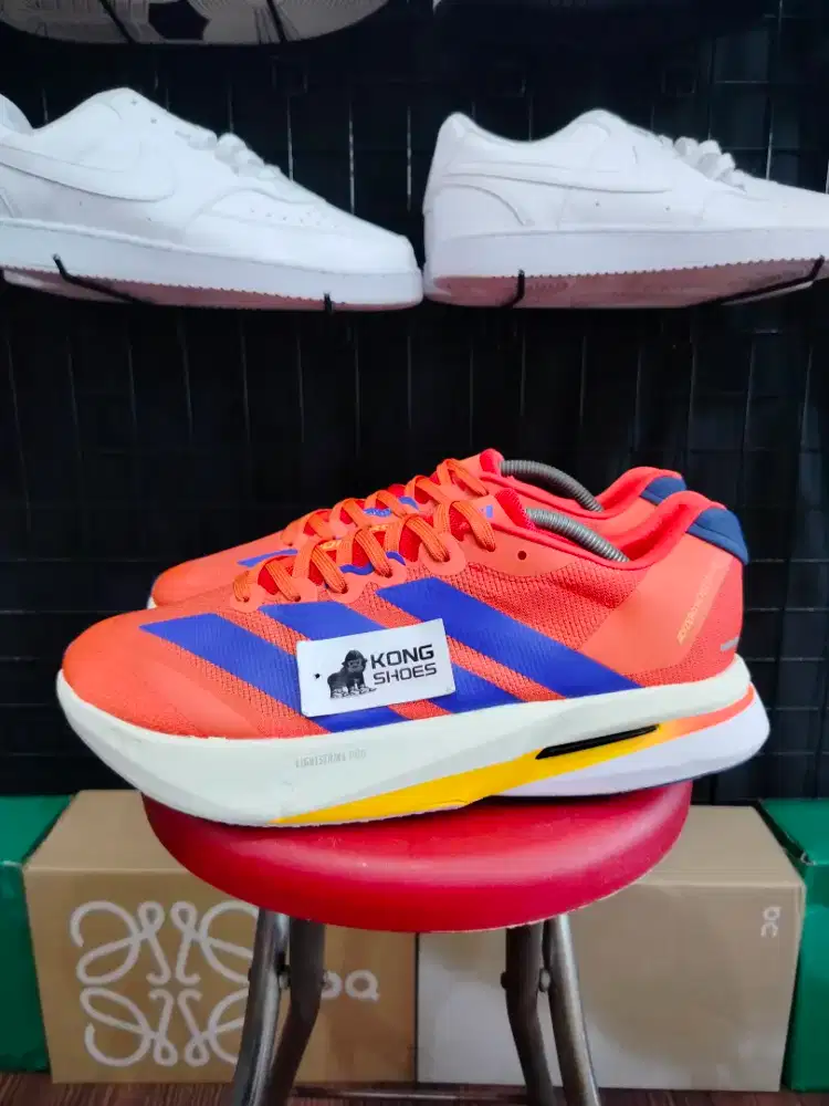 SEPATU ADIZERO BUSTON 13 ORANGE BLUE