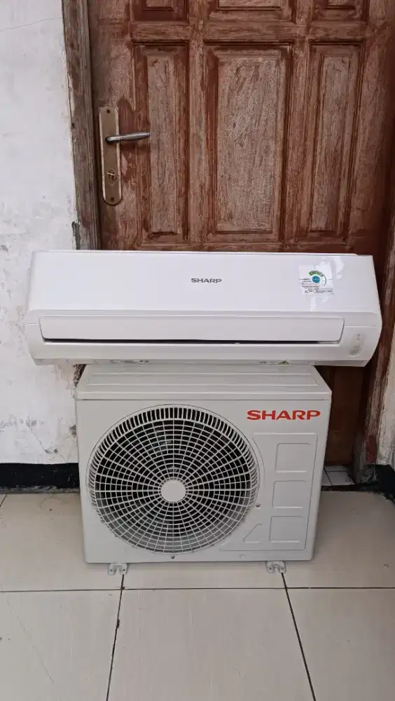 ac sharp second 1/2 pk original garansi 6 bulan