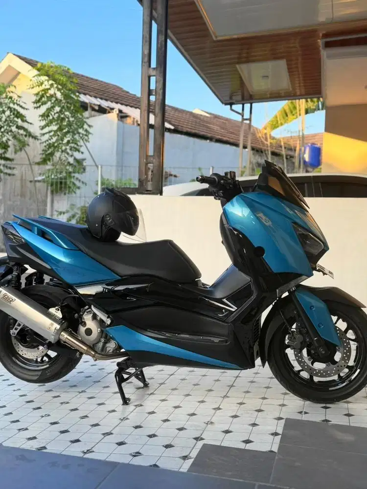 xmax tahun 2021