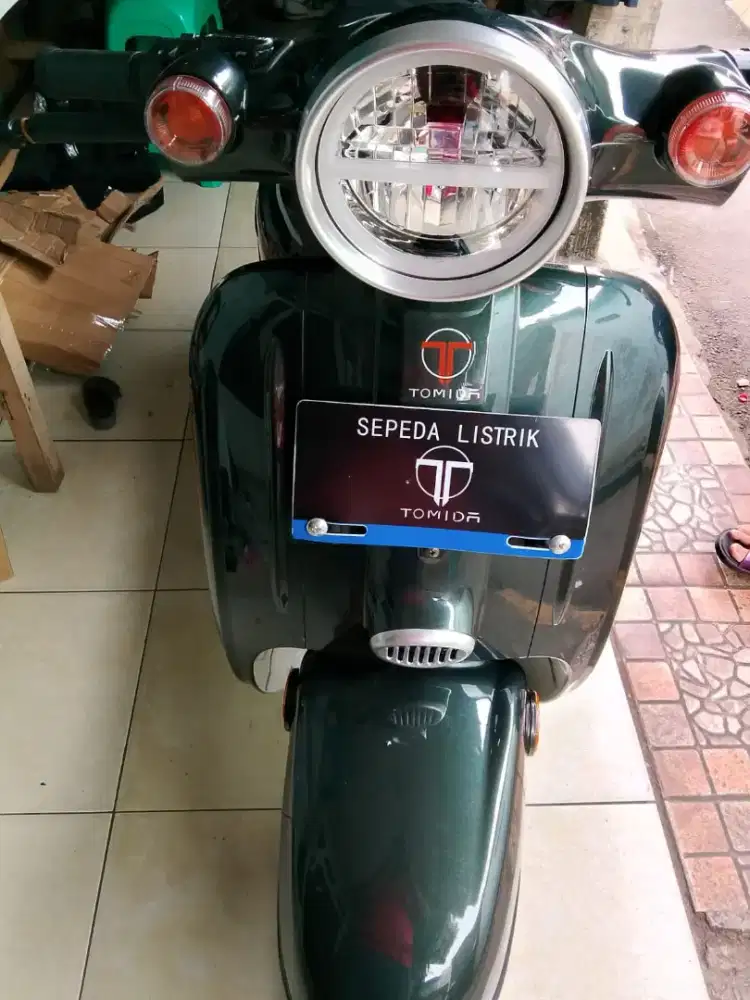 Sepeda listrik merk tomida scooty
