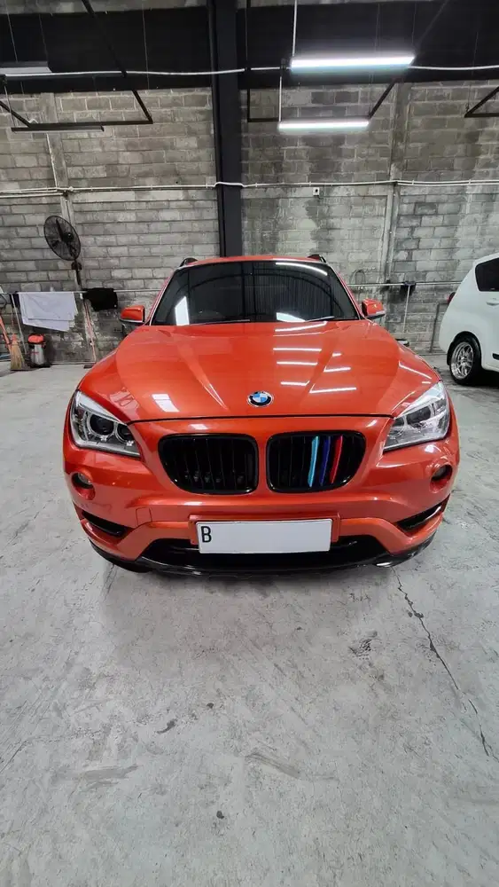 BMW X1 sDrive18i AT 2015 Orange Metalik | KM 60 Rb slow going
