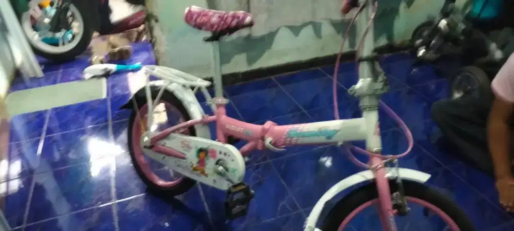 Sepeda lipat anak perempuan family edisi dora