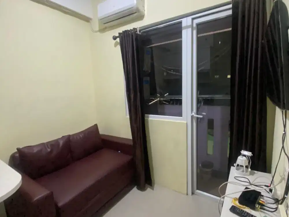 Apartemen the green pramuka city 2 kamar furnish