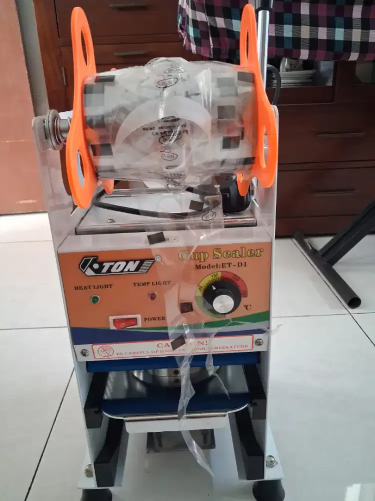 Cup sealer dan dispenser