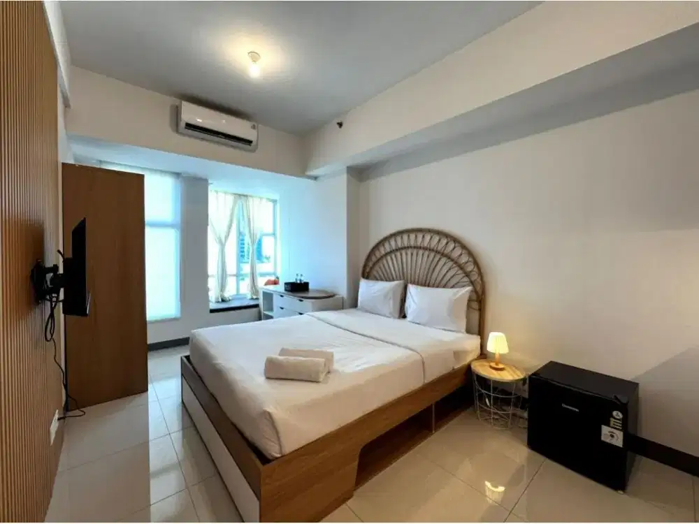 disewakan apartemen puncak CBD 2 BR furnish biasa 15jt/tahun