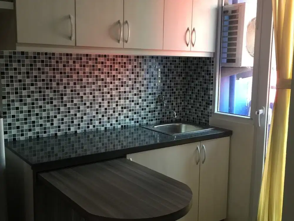 Apartemen the green pramuka city studio furnish tower