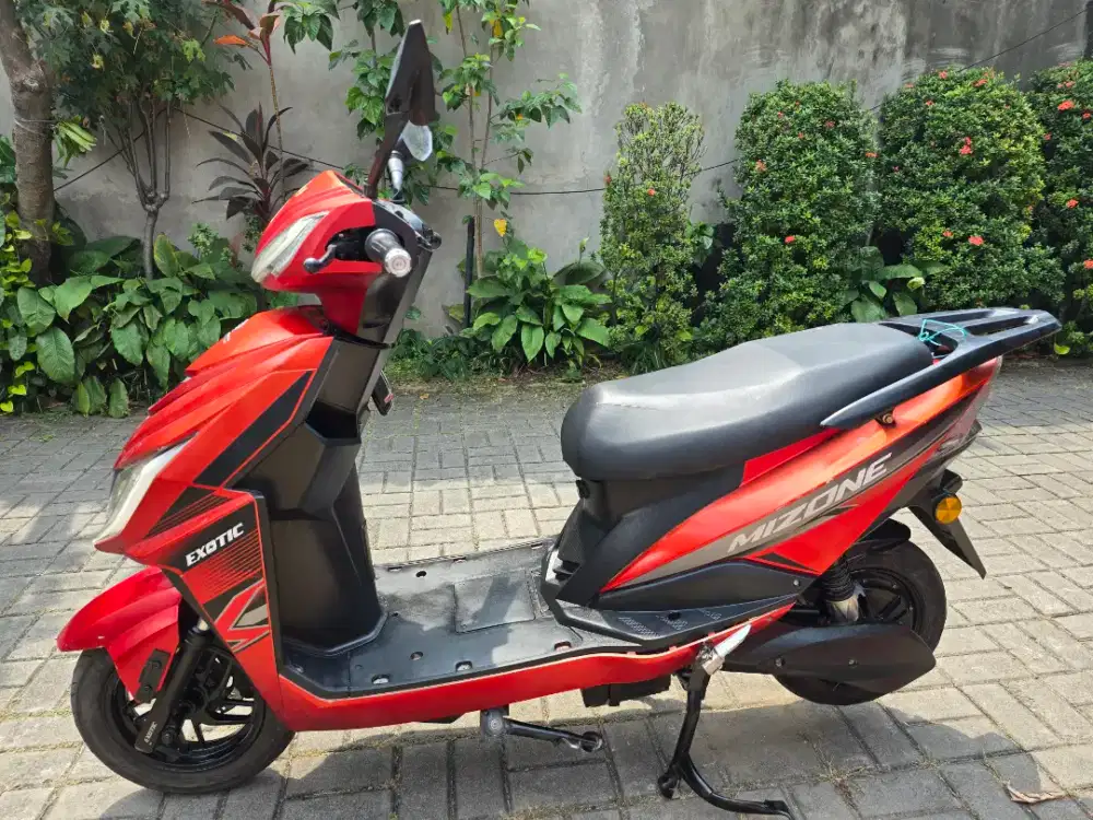 Motor listrik Exotic Mizone paper.