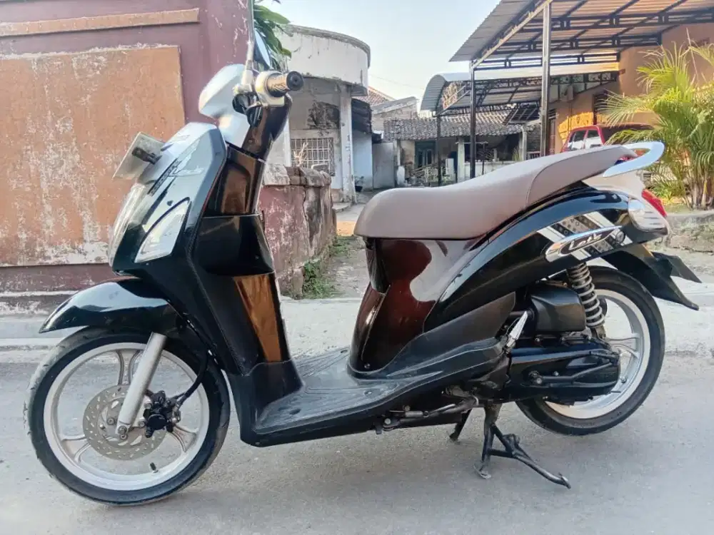 Suzuki let's 2013