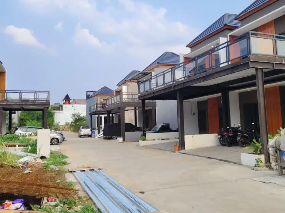 Rumah cluster exclusive pinggir jalan raya jatiwarna cuma 900juta an dekat pintu tol