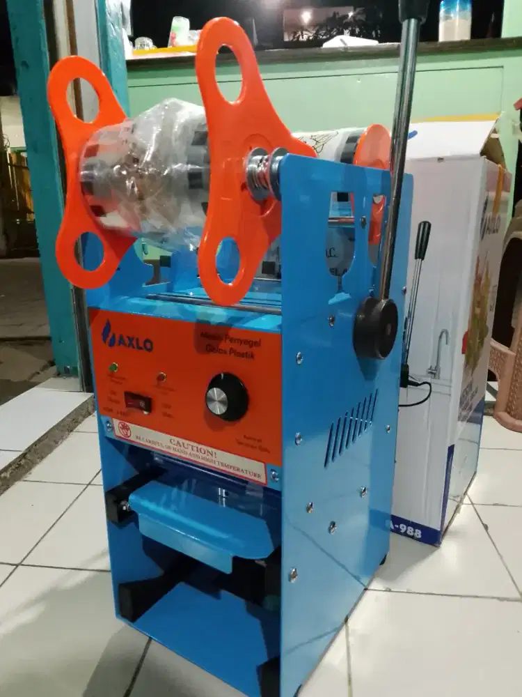 Di jual cepat mesin cup sealer merk axlo
