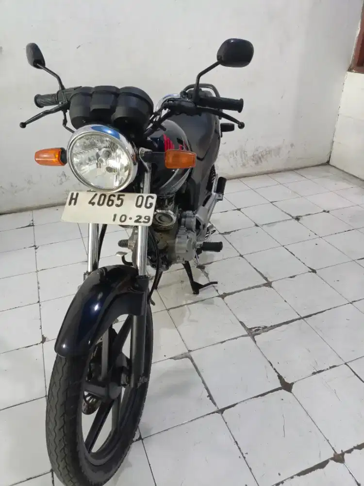 mega pro 2009 hitam