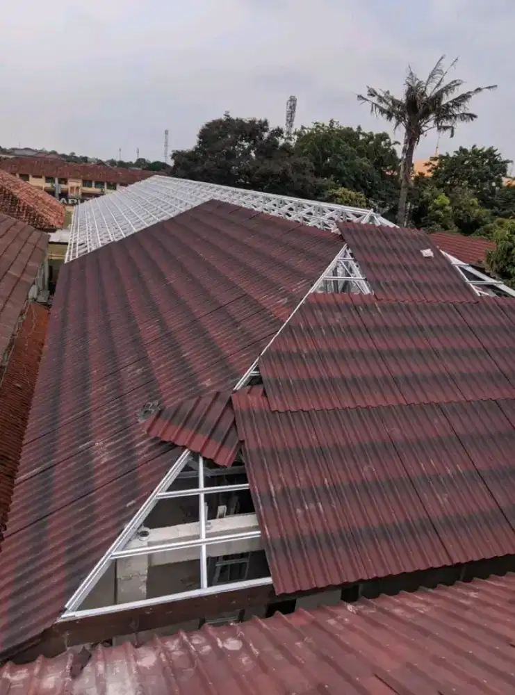 TukanG atap BocoR