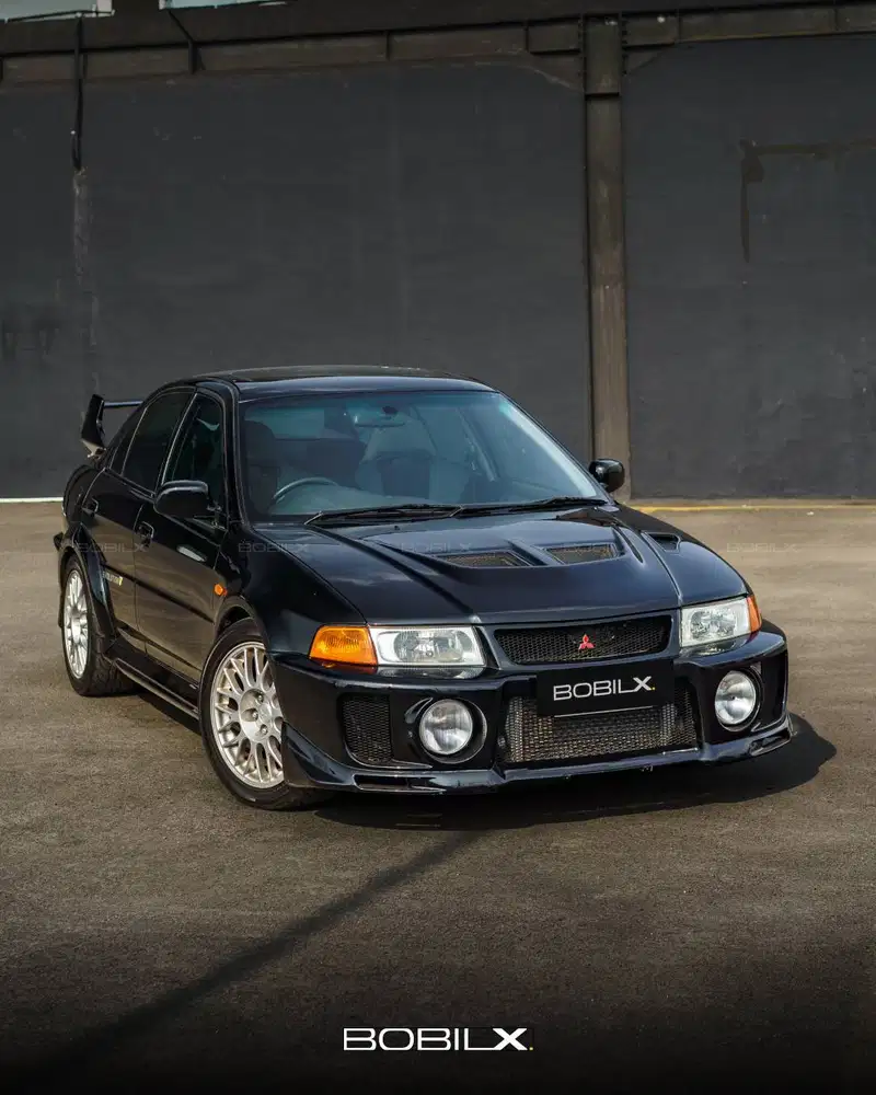 NIK 1997 Mitsubishi Lancer Evolution V Black on Black