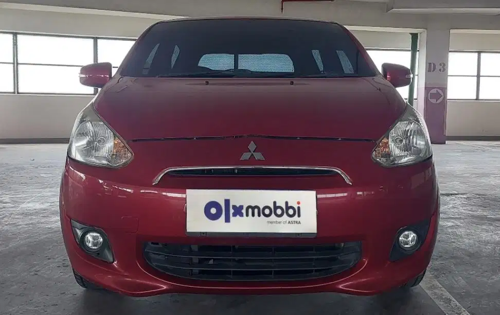 TDP 5, JT Mitsubishi Mirage 1.2 Exceed Bensin-AT Merah 2015