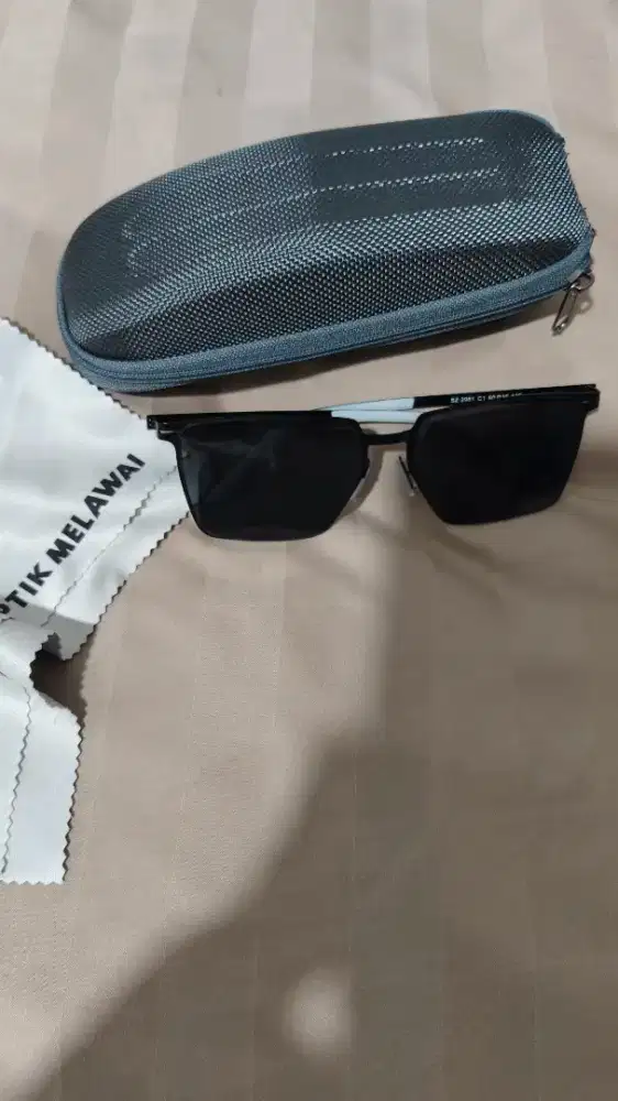 Kacamata hitam prairie ,optik melawai