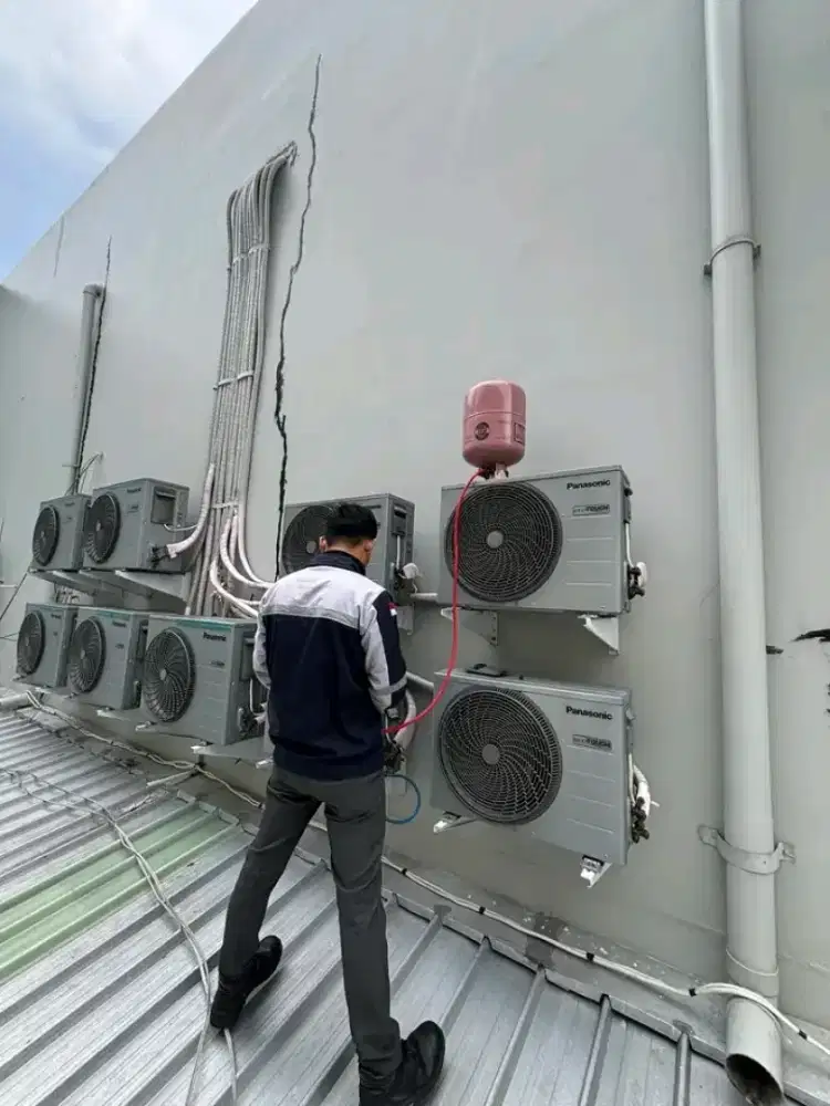 Service AC bongkar pasang AC
