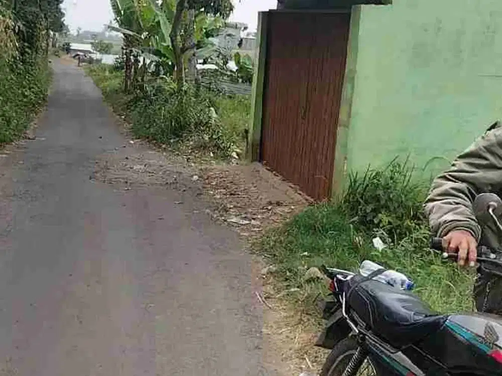 di jual sebidang kebun bibir jalan muka lebar 100m² surat SHM PRONA DEKAT KE AKSES KELUAR TOL
