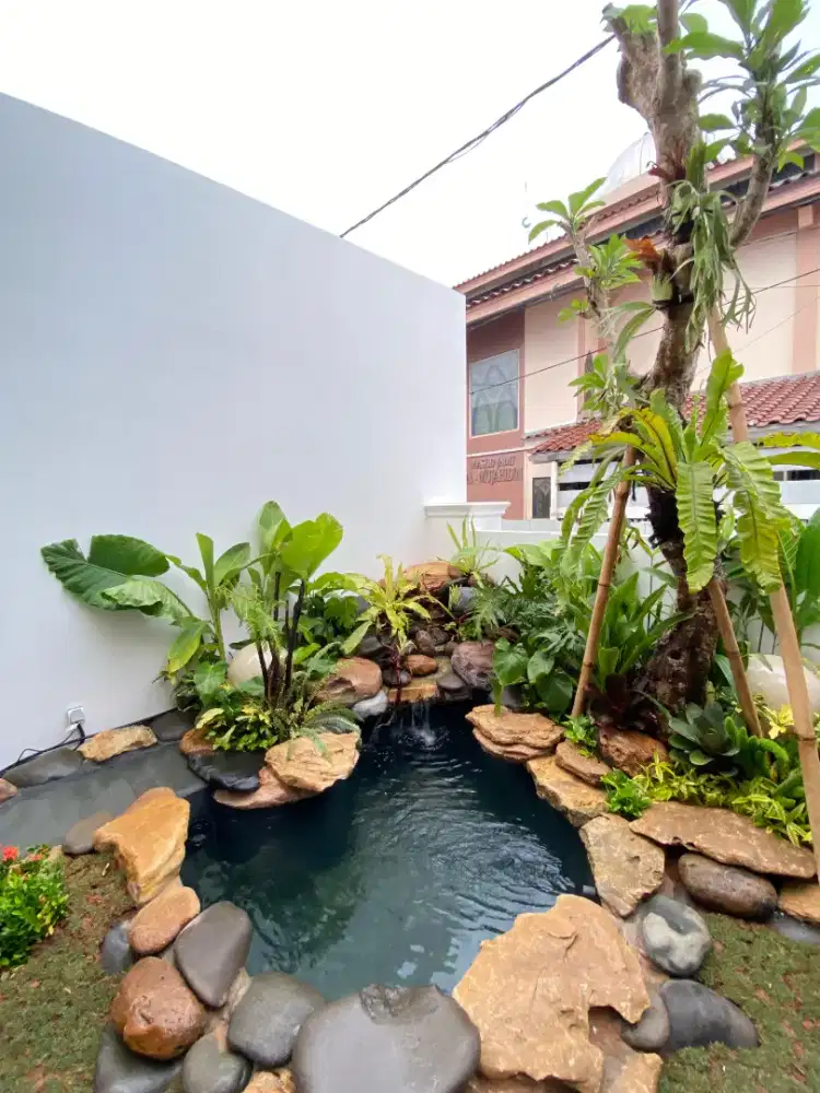 Kolam minimalis dengan taman kering