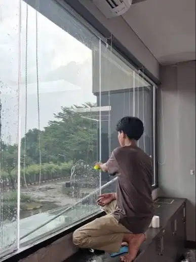 Tukang pasang kaca film