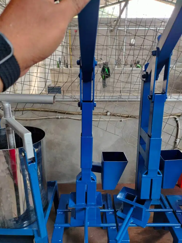 alat cetak press briket manual
