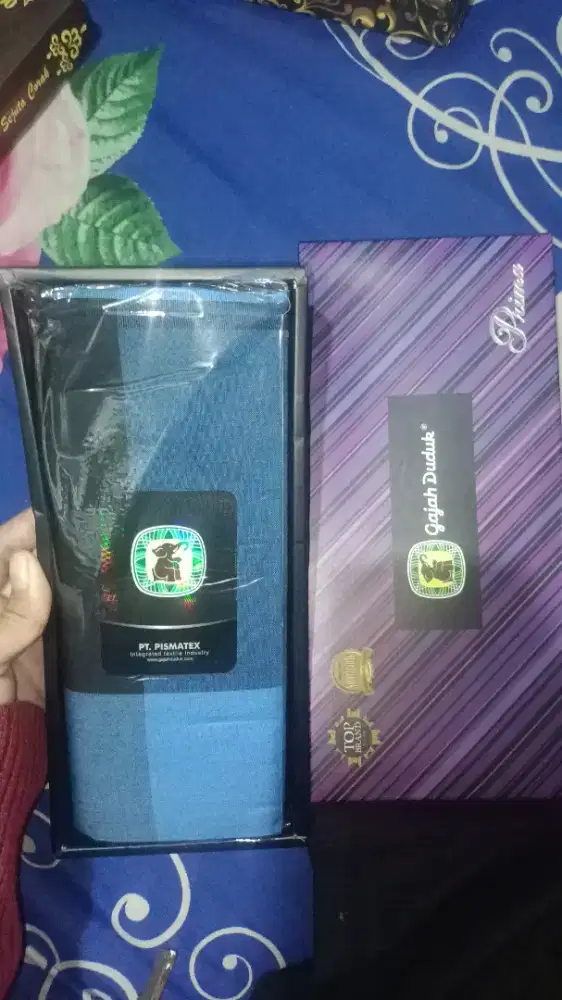 Sarung gajah duduk