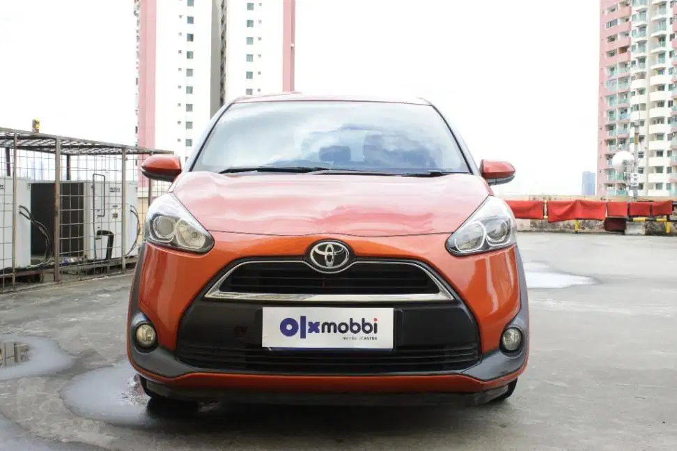 TDP 8, JT Toyota Sienta 1.5 V Bensin-AT Orange 2016