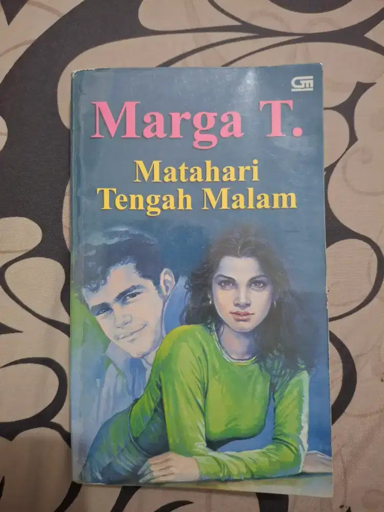Matahari Tengah Malam, Marga T