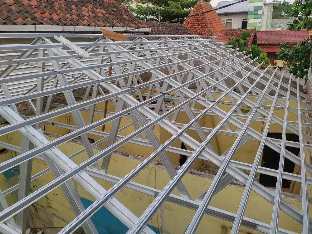 Atap Awet Renovasi Pakai Genteng Beton MUTIARA dan Baja Ringan Kencana
