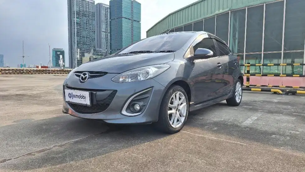 Mazda 2 1.5 R Bensin-AT 2013 Abu