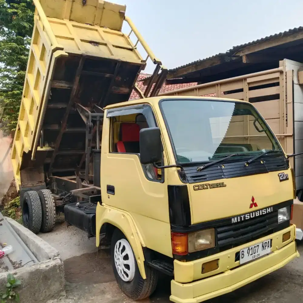 Jasa urugan dan buang puing