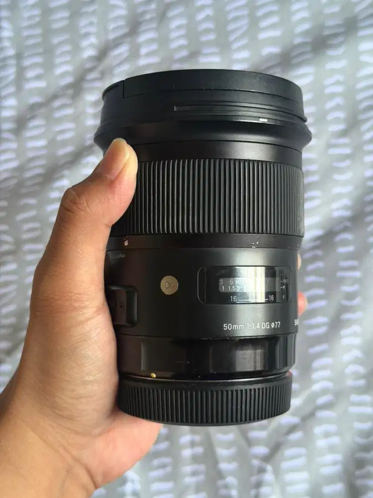 Lensa 50mm sigma art for canon