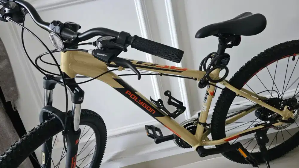 Sepeda polygon seperti baru